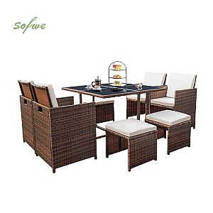 Lujoso juego de mesa de mimbre para exterior con sillón y...